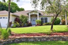 Beautiful home with lovely landscaping in a quiet neighborhood