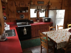 Rustic lakefront chalet - private dock - special kids room