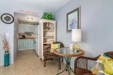 Snowbird-friendly, corner condo w/ balcony & pool view - a block from the ocean