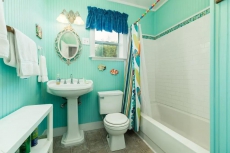 Dog-friendly island home with huge deck and fenced backyard