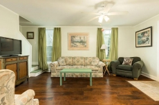 Dog-friendly island home with huge deck and fenced backyard