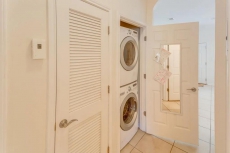 Dog-friendly condo w/ shared pool - one block from the beach