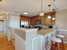 Heated Pool Access | Perfectly Located Tybee Condo with Private Balcony