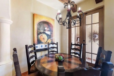 Colorful coastal retreat with sweeping ocean views, huge patio, & shared pool