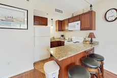 Double-Unit Condo with River Views, Walkable Locale & Free Parking