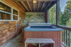 Charming, dog-friendly cabin with two decks, hot tub, waterfall, and more!