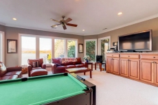 Stunning lakefront estate on one acre w/ a private dock, free WiFi, & more!