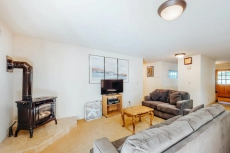 Single-level, family-friendly getaway w/ a full kitchen, deck, & pool table