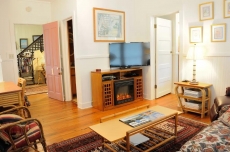 Living Room / Bedroom One (view one)